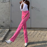 Vaqueros de tiro bajo con cordones y ojales